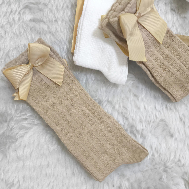 جوراب نخی نیم ساق دخترانه طرح گندمی با پاپیون (مناسب 6 ماه تا 6 سال)